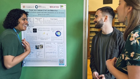 CREATES DLA students discuss their research at a poster session, May 2026